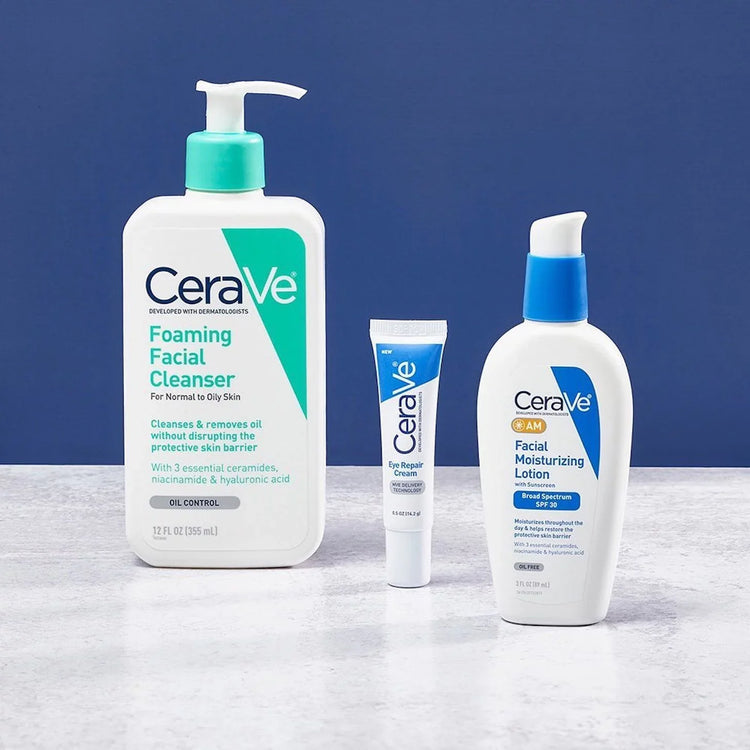 CeraVe skincare products: a foaming facial cleanser, an eye repair cream, and a moisturizing lotion with SPF 30, arranged on a surface.