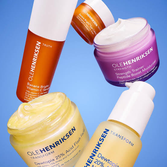 A collection of Ole Henriksen skincare products including serums and creams.
