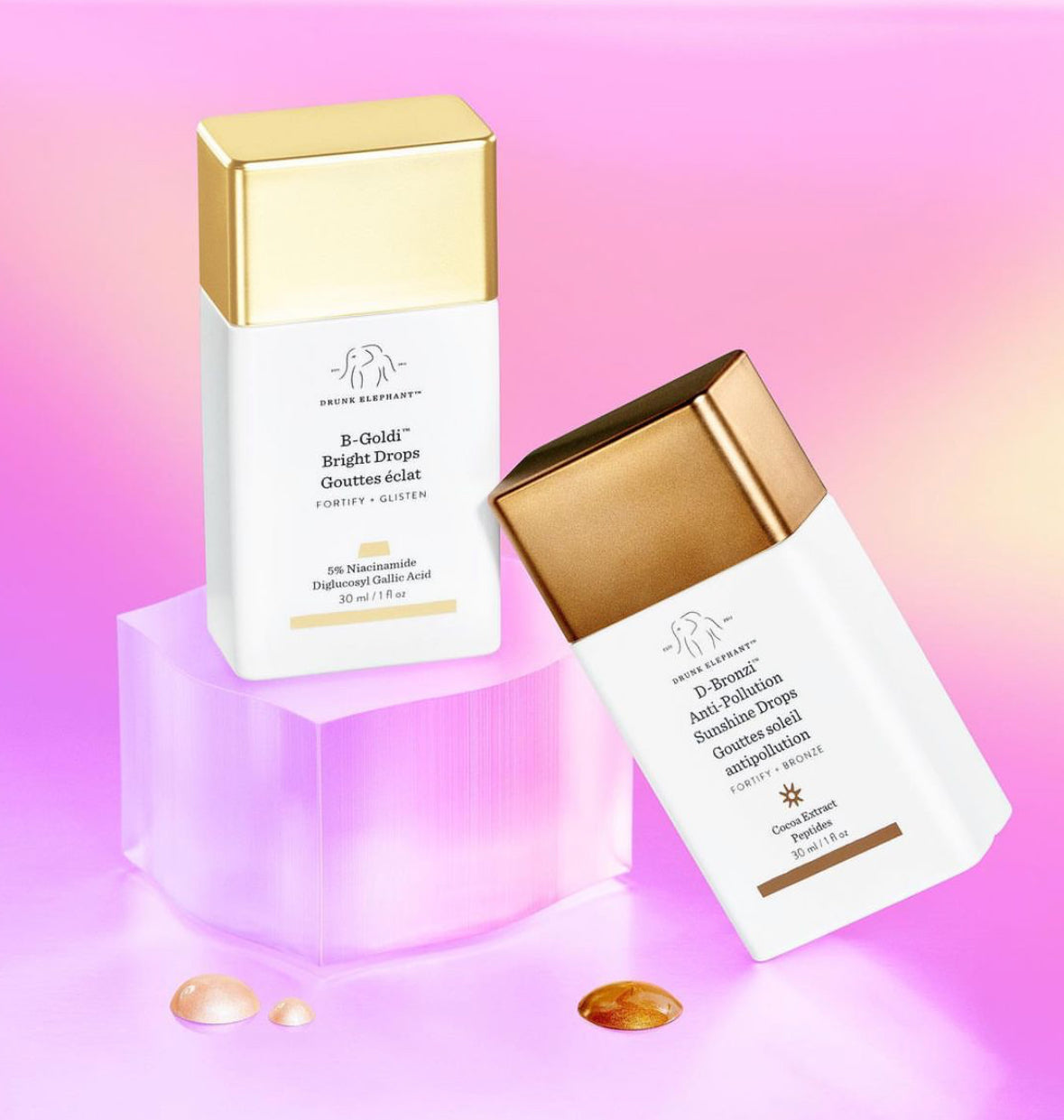 Two Drunk Elephant skincare products, B-Goldi Bright Drops and D-Bronzi Anti-Pollution Sunshine Drops.