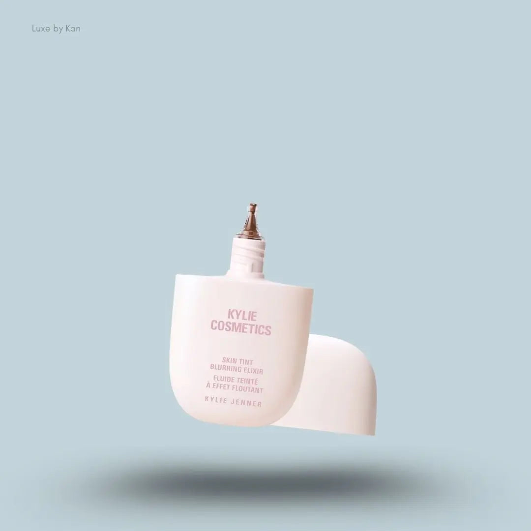 Kylie Cosmetics Skin Tint Blurring Elixir Foundation 30ml bottle on blue background — LBK India