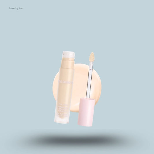Kylie Cosmetics Power Plush Longwear Concealer bottle and swatch on blue background — LBK India