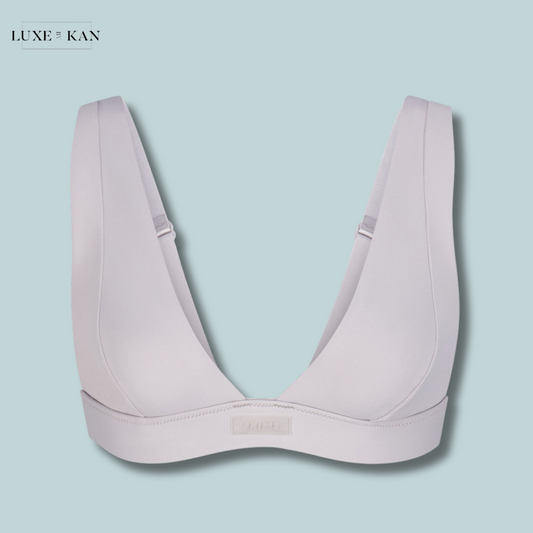 SKIMS Plunge-neck brand-patch recycled stretch-nylon bikini top