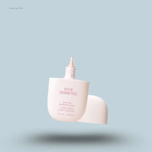 Kylie Cosmetics Skin Tint Blurring Elixir Foundation 30ml bottle on blue background — LBK India