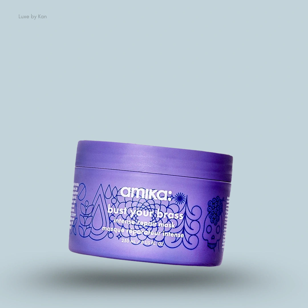 Amika Bust Your Brass Intense Repair Hair Mask box on blue background — LBK India