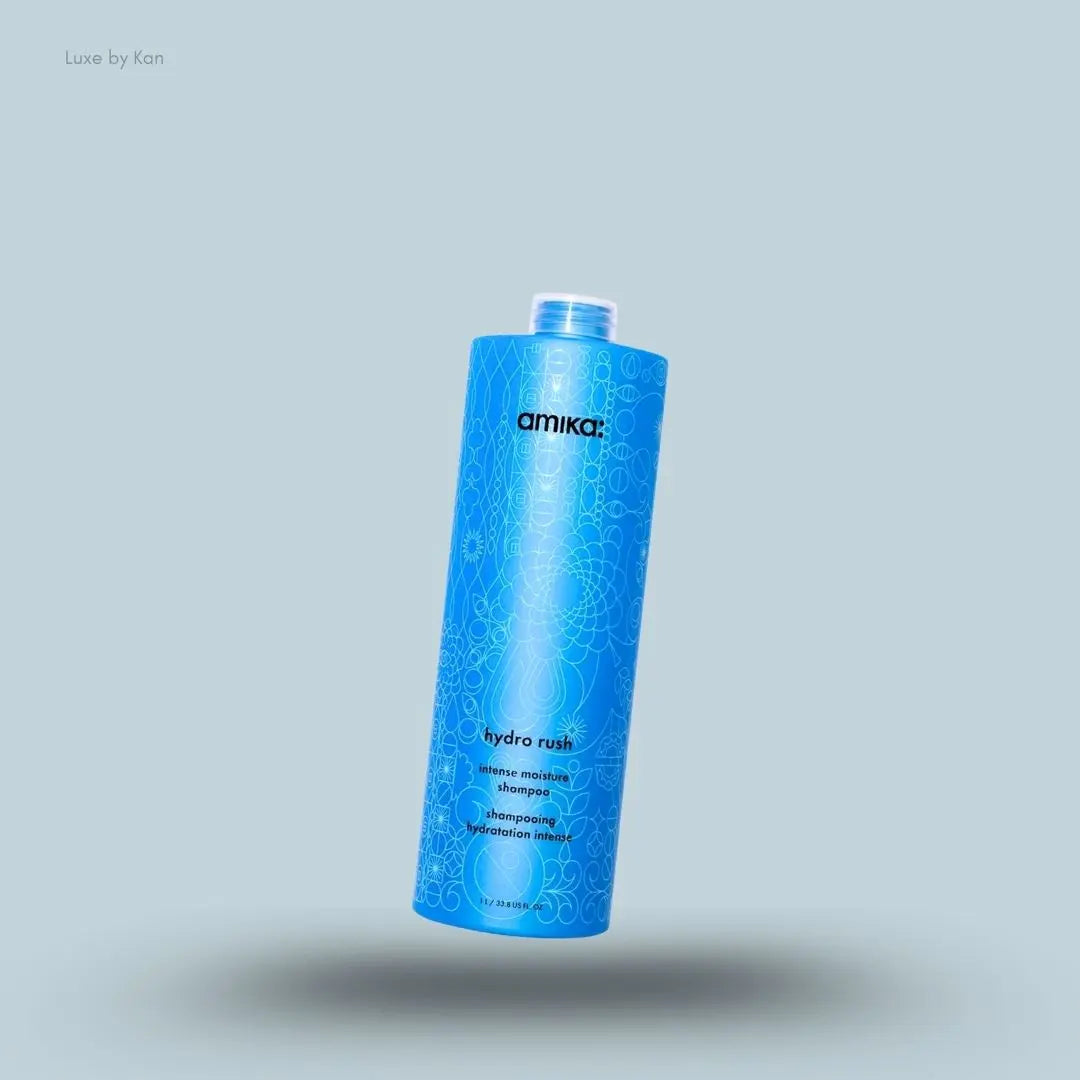 Amika Hydro Rush Intense Moisture Shampoo bottle on blue background — LBK India