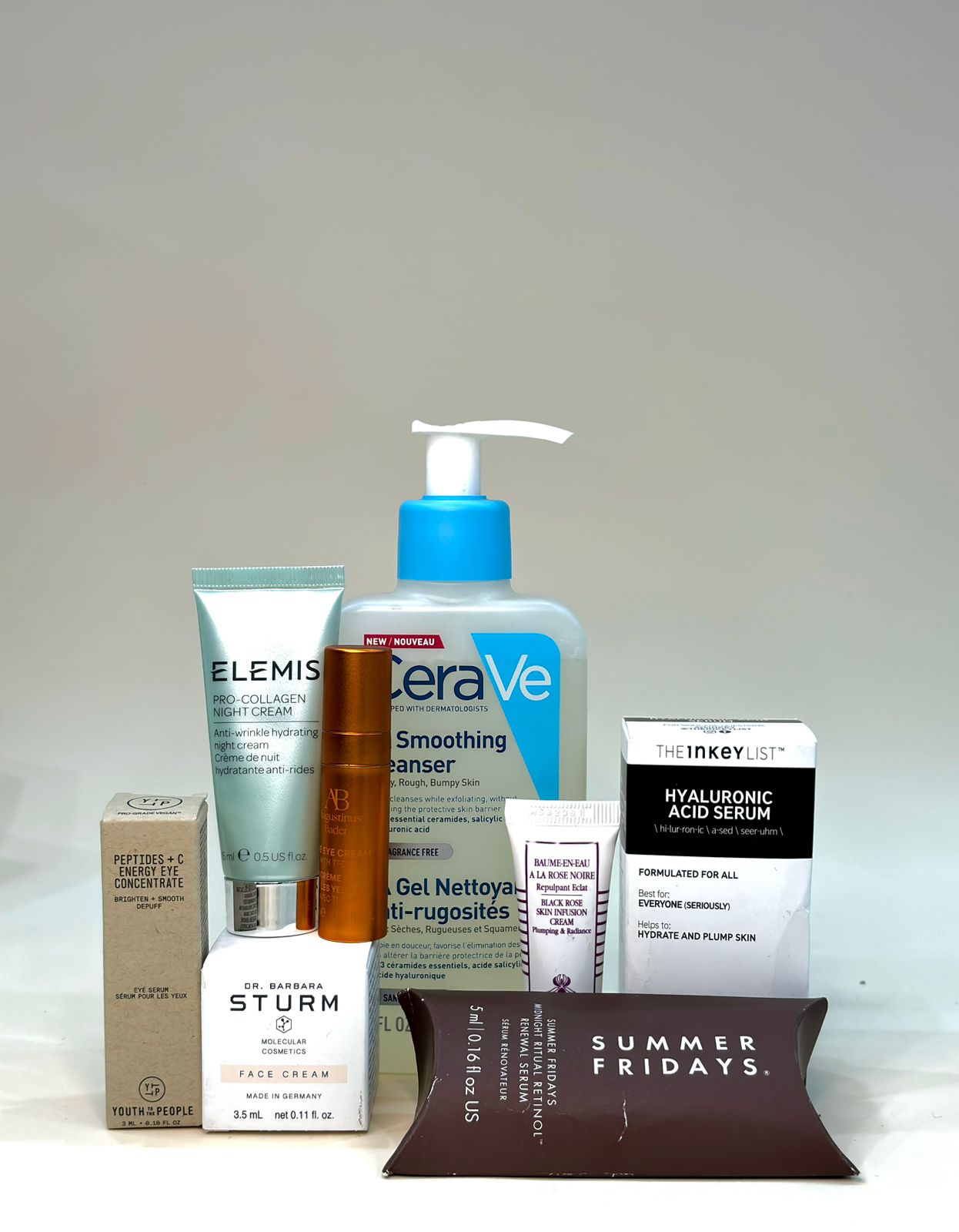 A variety of skincare products including cleansers, serums, and creams from brands like CeraVe, Elemis, and Summer Fridays.