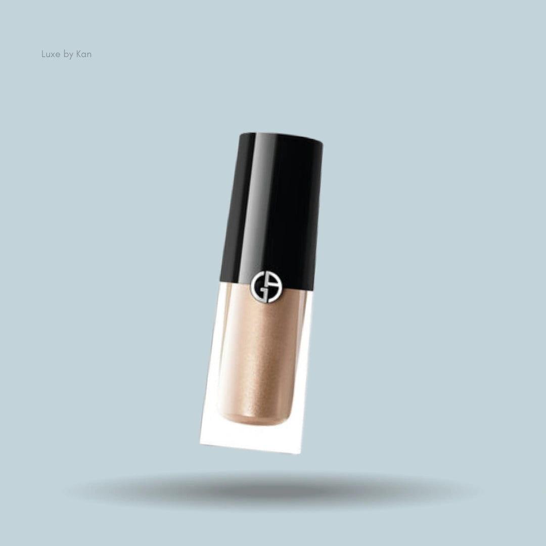 Armani caramel liquid eyeshadow tube with black cap.