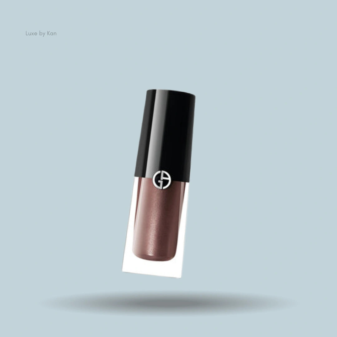 Armani caramel-colored liquid eyeshadow with black lid.