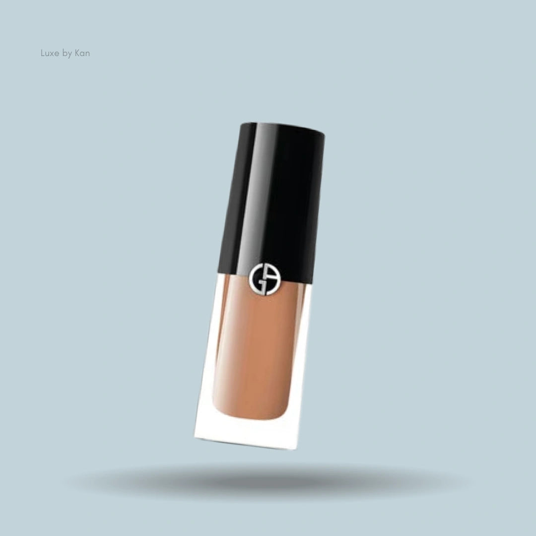 Armani caramel eye tint with black cap.