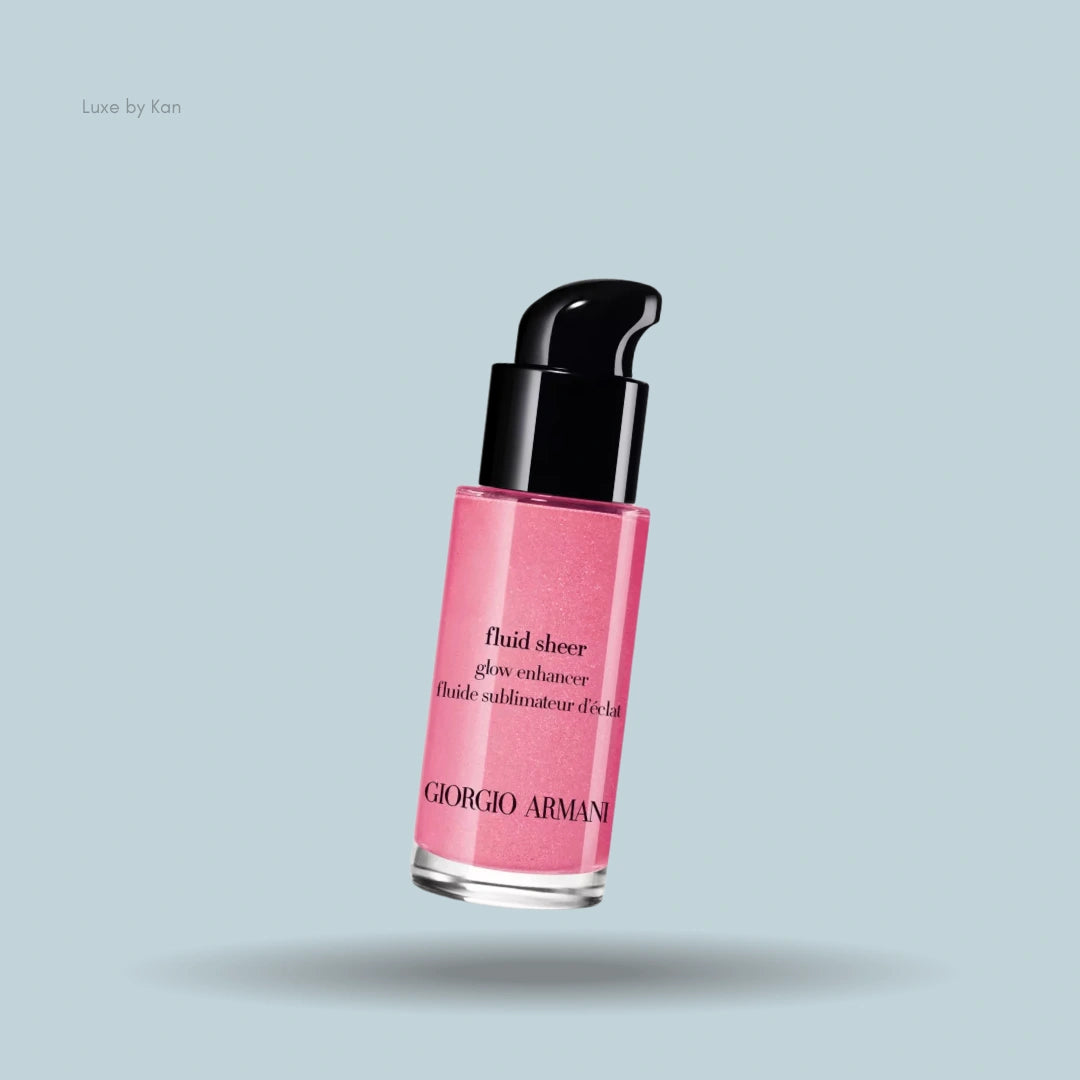 Armani Fluid Sheer Liquid Highlighter, with a pink liquid inside and a black pump dispenser.