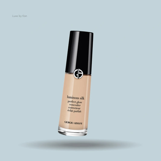 Armani luminous silk multi-purpose glow concealer in a glass bottle with a black cap.