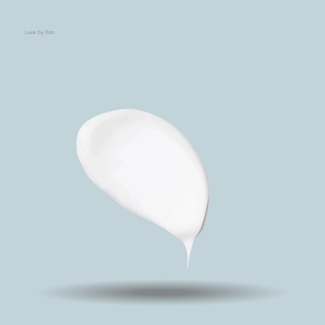 Swatch of white Augustinus Bader Body Lotion.
