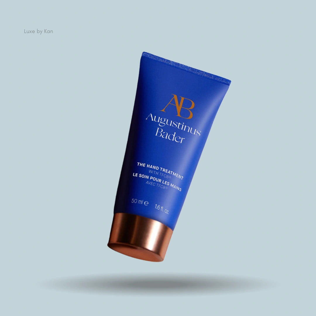 An Augustinus Bader The Hand Treatment tube in cobalt blue with a copper lid.