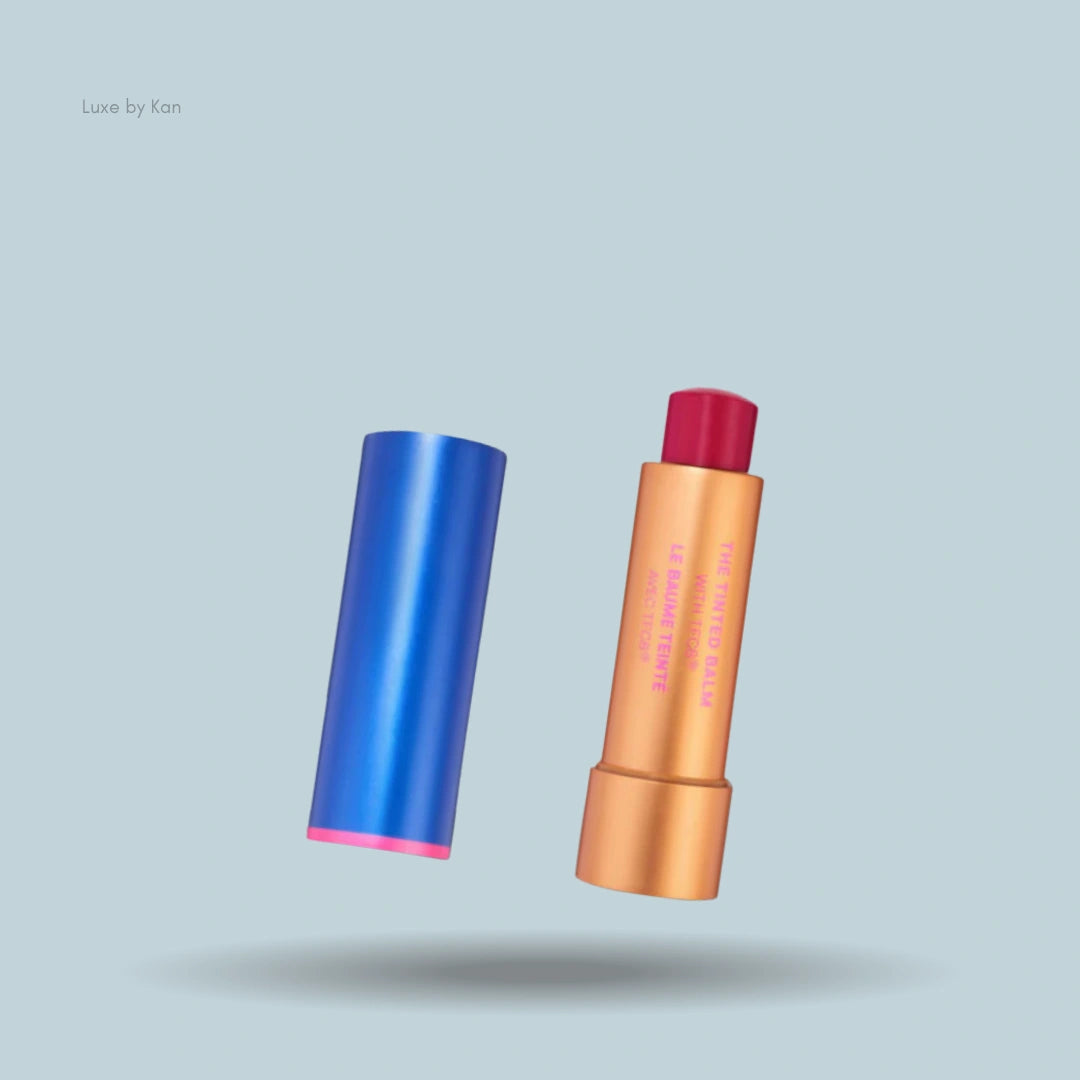 Augustinus Bader x Sofia Coppola tinted lip balm tube with cap off.