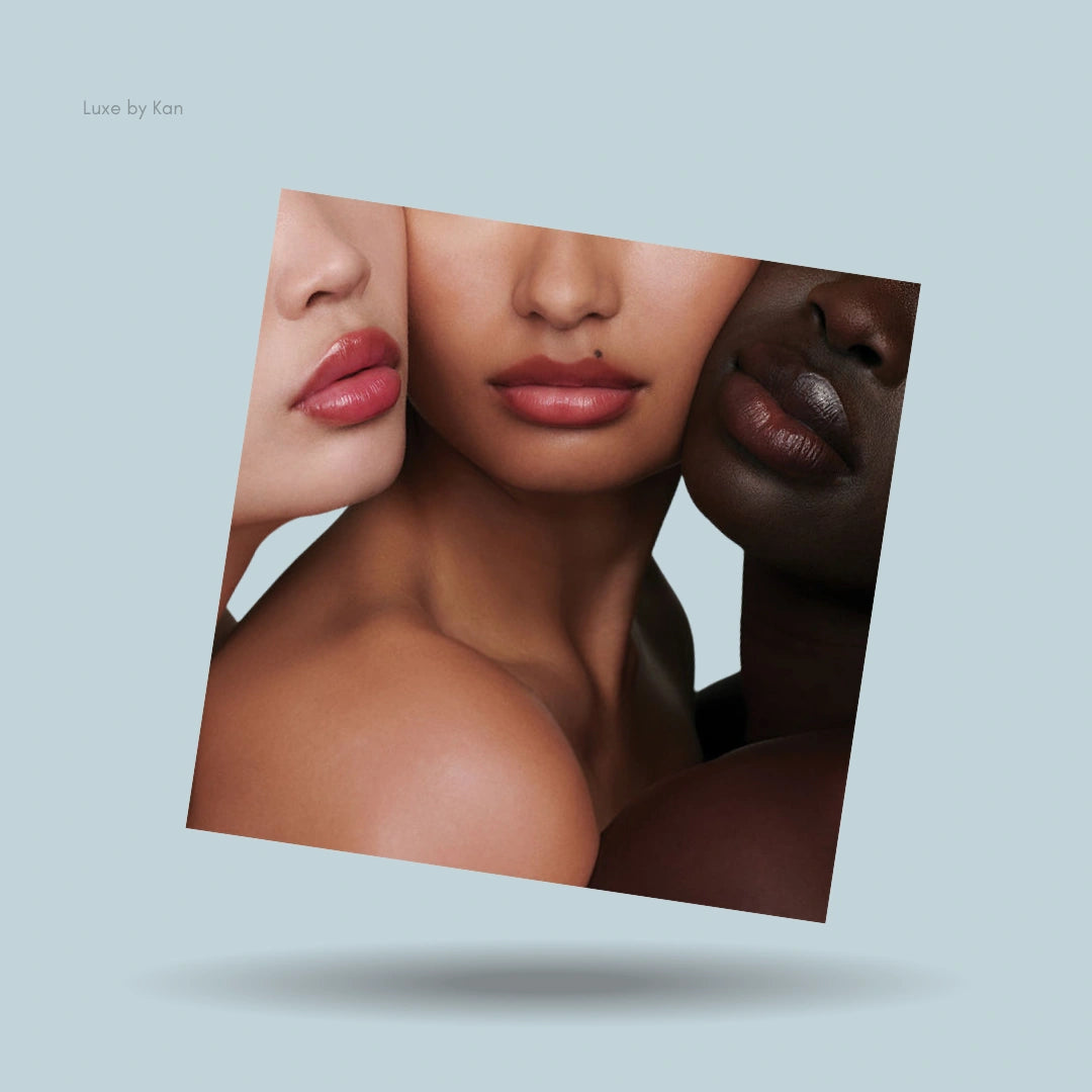 Three women with diverse skin tones wearing the Augustinus Bader x Sofia Coppola tinted balm.