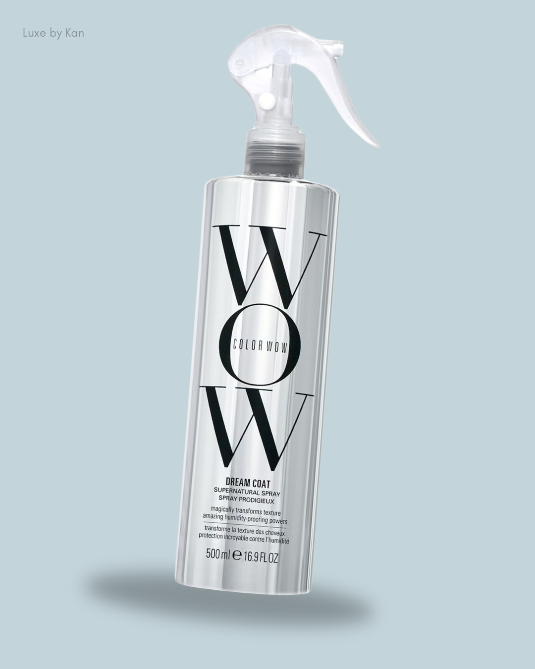 Color Wow Dream Coat Anti-Frizz Treatment in a clear bottle with a white spray nozzle, isolated on a light background.