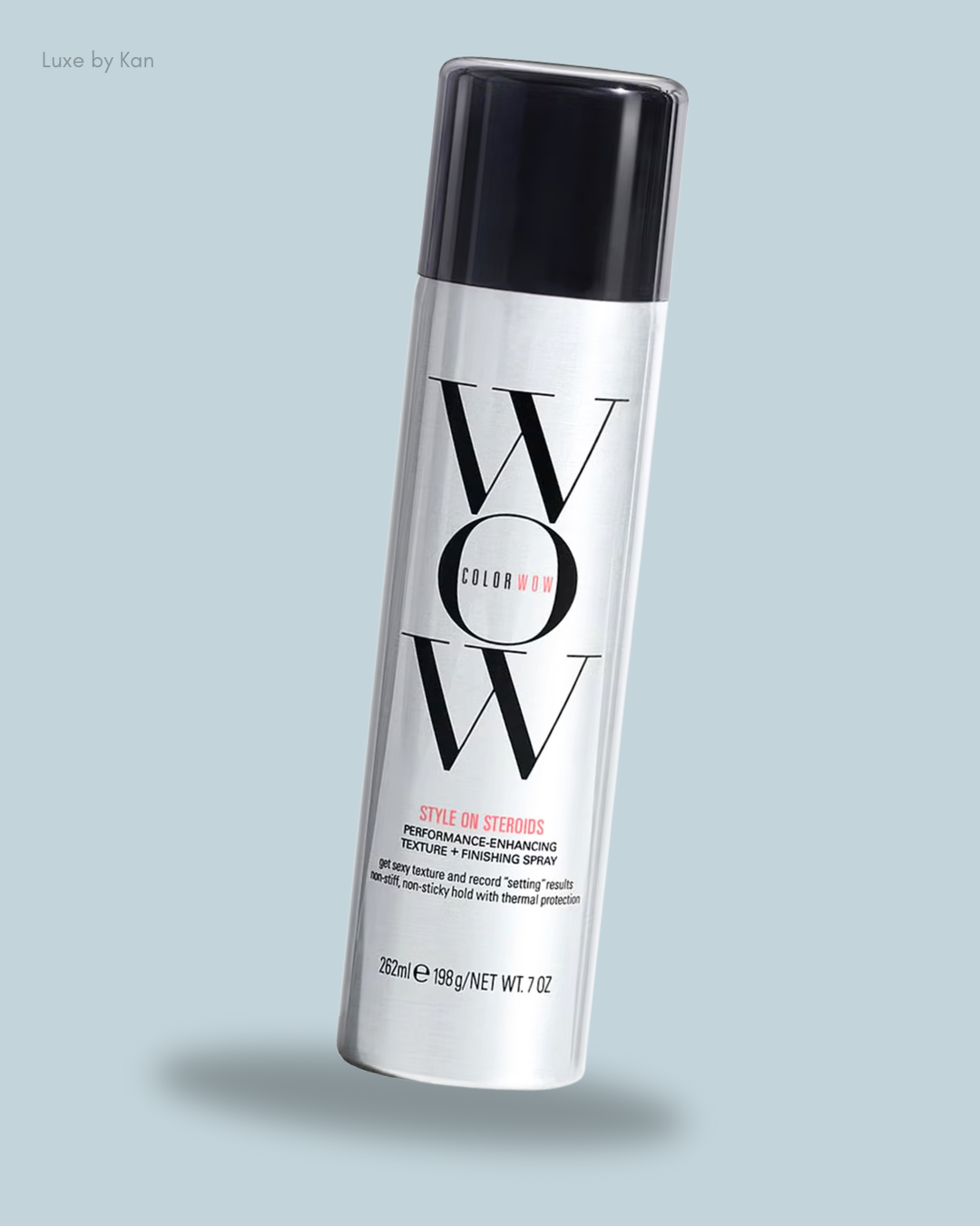 A silver spray can of Color Wow's "Style on Steroids," offering performance-enhancing texture and finishing spray for hair.
