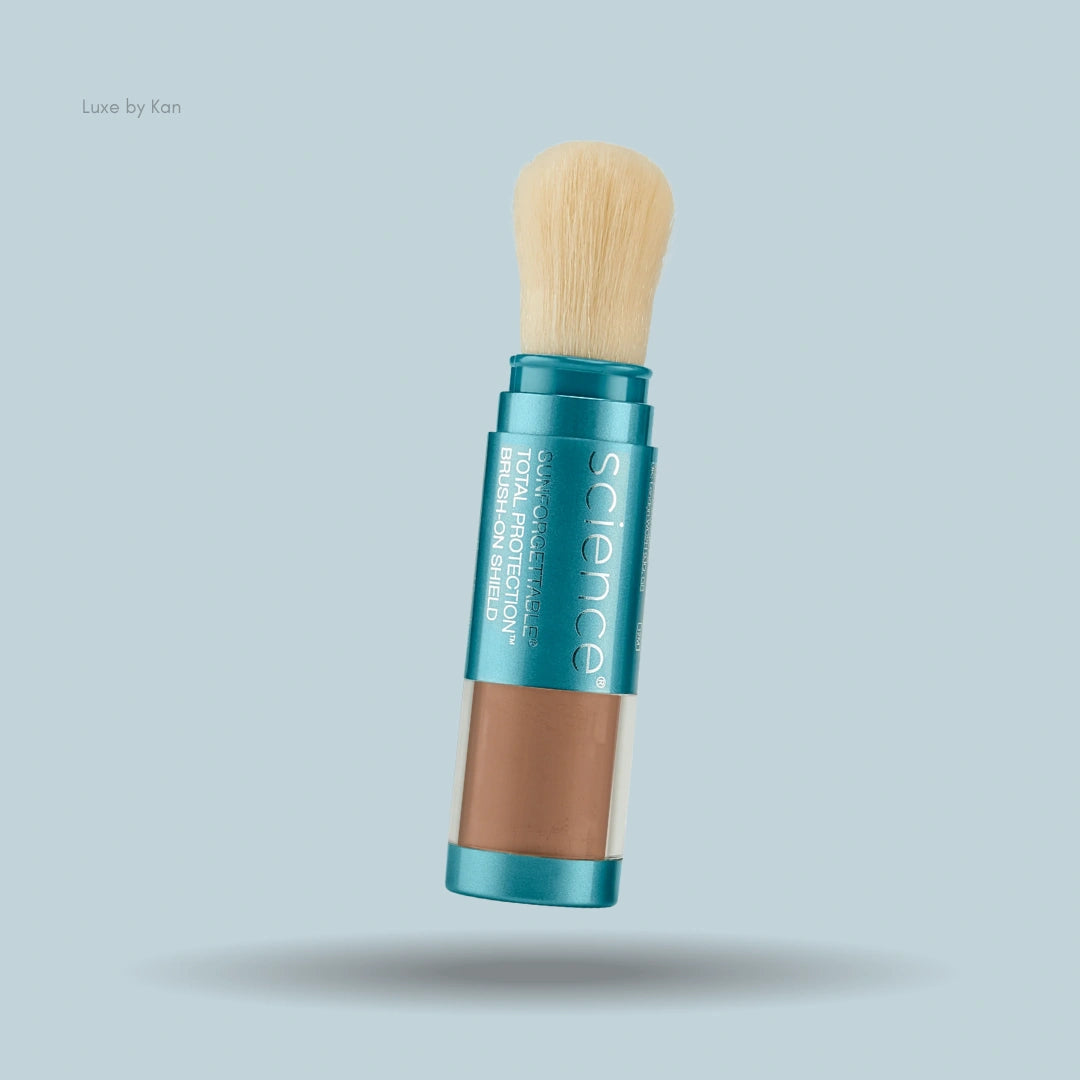 Colorescience Sunforgettable Total Protection Brush-On Shield SPF 50, featuring a retractable brush applicator and tinted powder base.