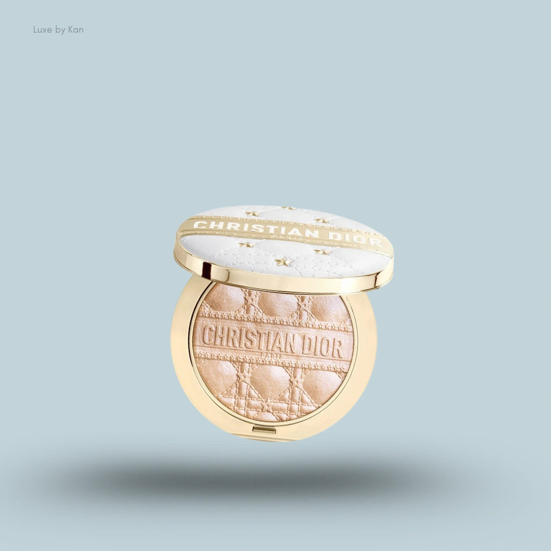 An open gold and white Christian Dior Forever Glow Luminizer Highlighter compact with a quilted star design.