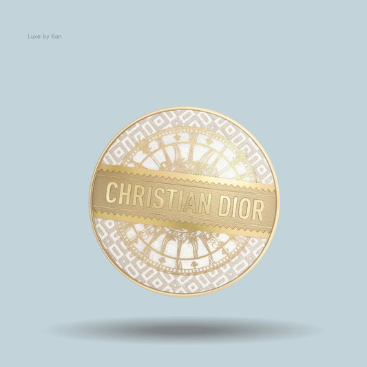 Dior Forever cushion foundation case with a circular white and gold pattern and a golden banner displaying the brand name.