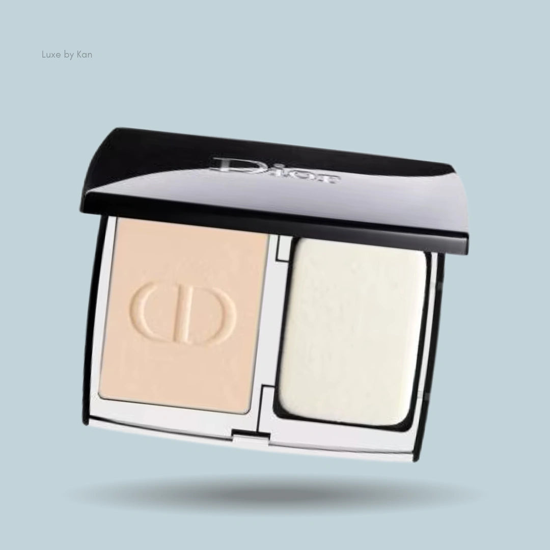 Dior Forever Natural Velvet powder foundation compact in an open black and white case displaying the powder with the CD logo and sponge applicator.
