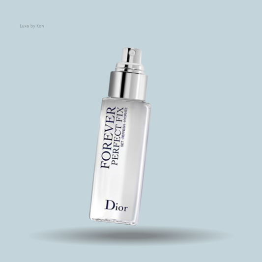 Dior Forever Perfect Fix setting spray in a white bottle with a silver pump.
