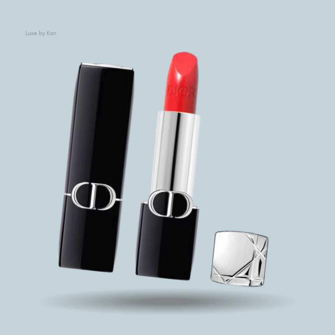 Dior Rouge New Velvet lipstick with black case and silver logo.