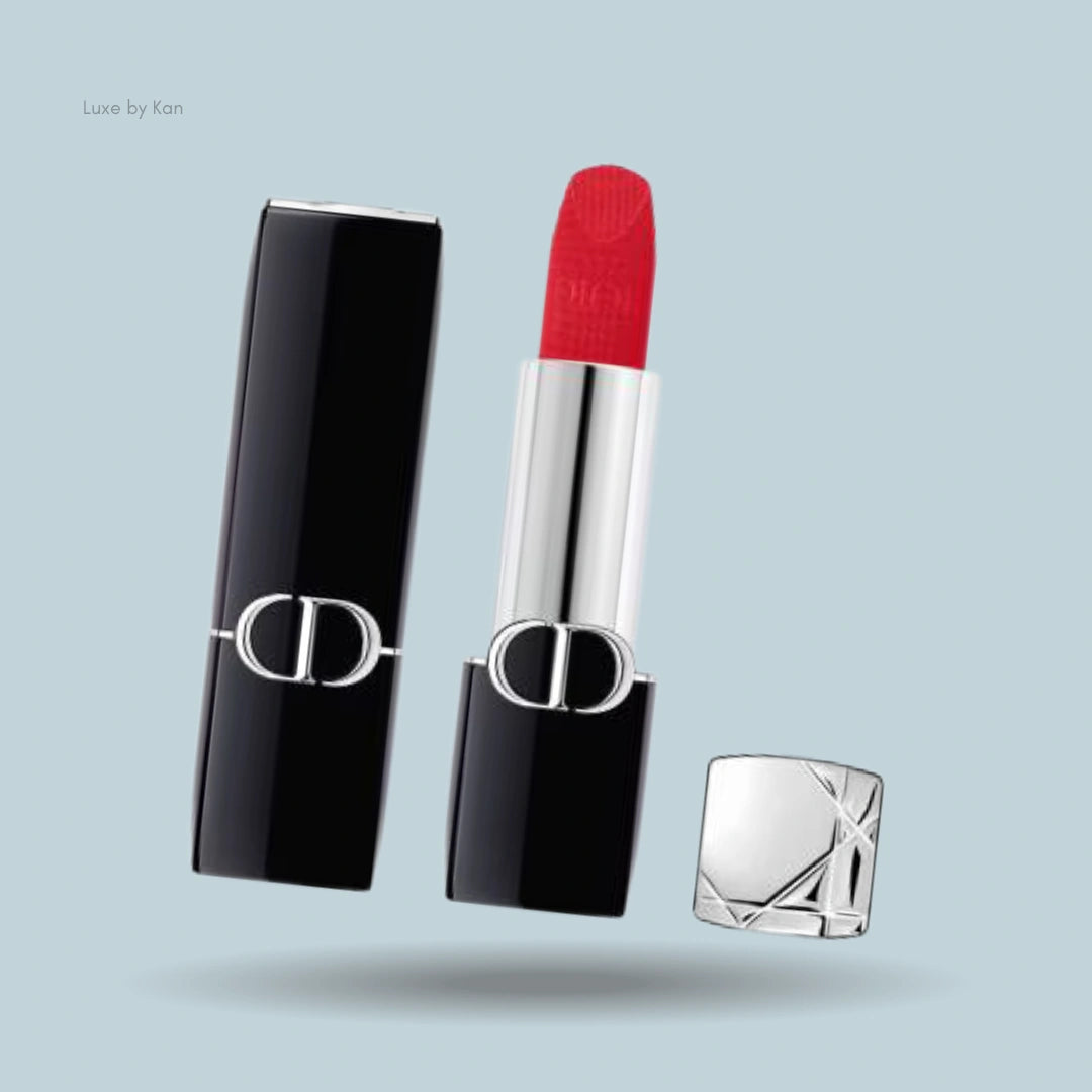 Dior Rouge Velvet Lipstick in a bold red shade, presented in signature black and silver packaging for a luxurious, high-impact look.