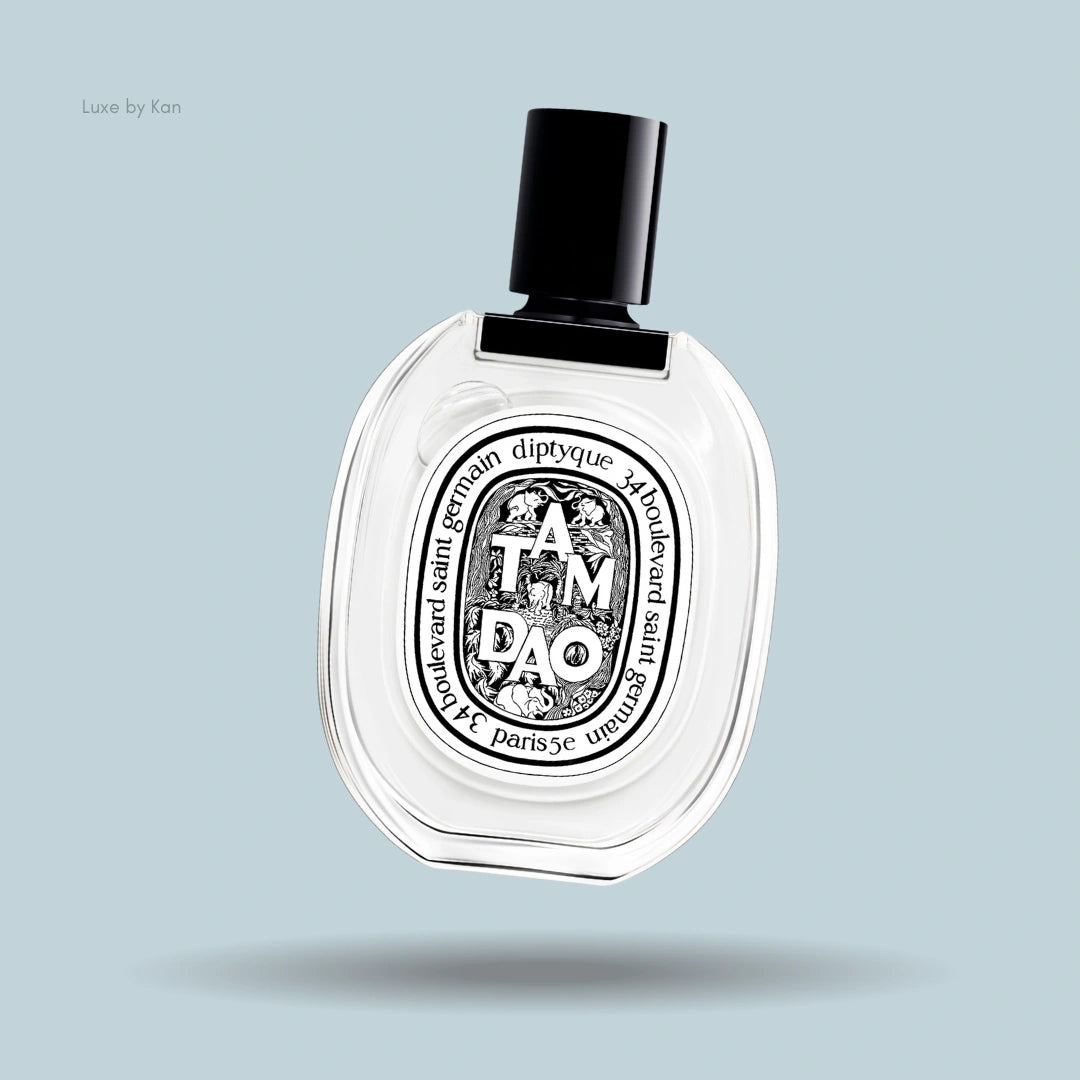 Diptyque Tam Dao Eau de Toilette in an oval-shaped transparent bottle with a black cap and signature black label.