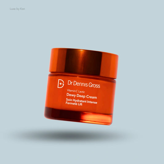 An orange jar of Dr Dennis Gross Vitamin C and Lactic Dewy Deep Cream.