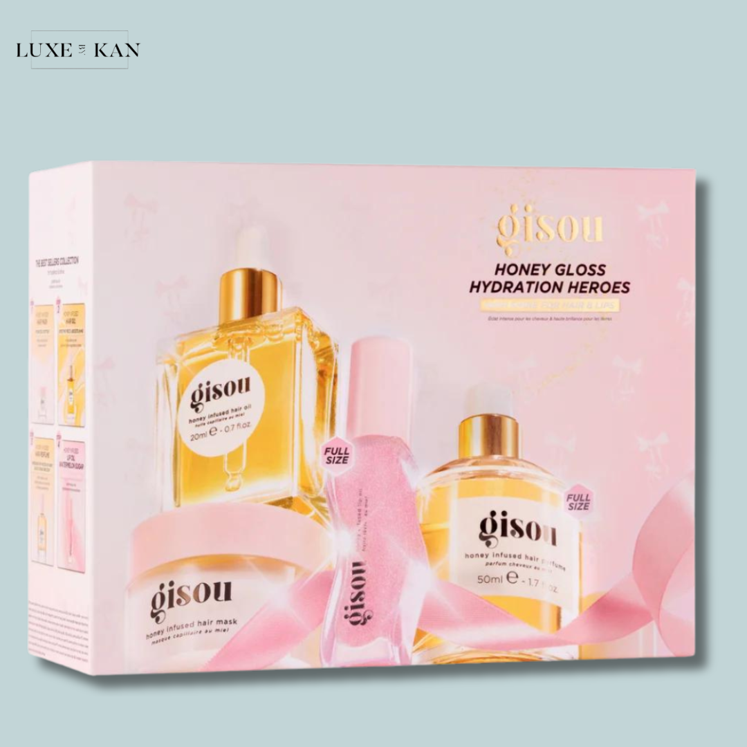 Gisou hair care set featuring honey-infused hair oil, a hair mask, and a spray.