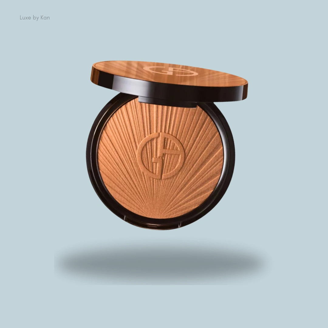 Giorgio Armani Luminous Silk Summer Glow bronzer, with open compact revealing sunburst bronze powder.