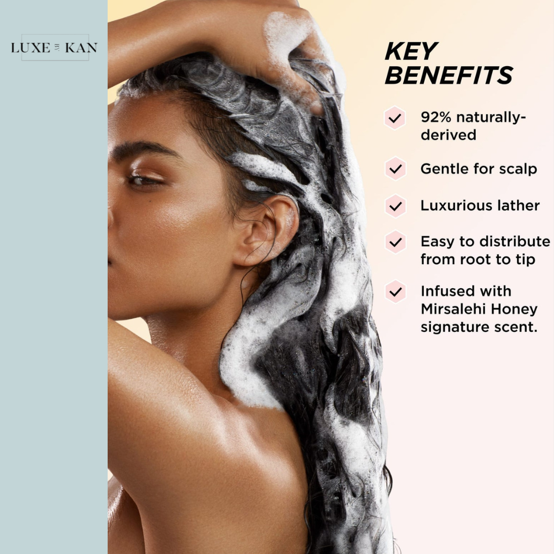 Woman appling shampoo to their hair, showcasing luxurious lather, with text highlighting key benefits of the product.