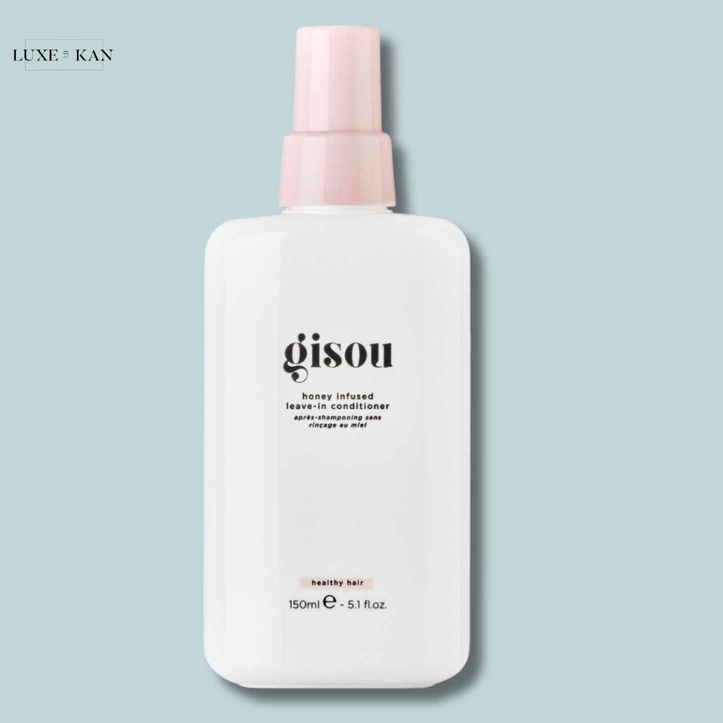 Gisou honey-infused leave-in conditioner bottle.