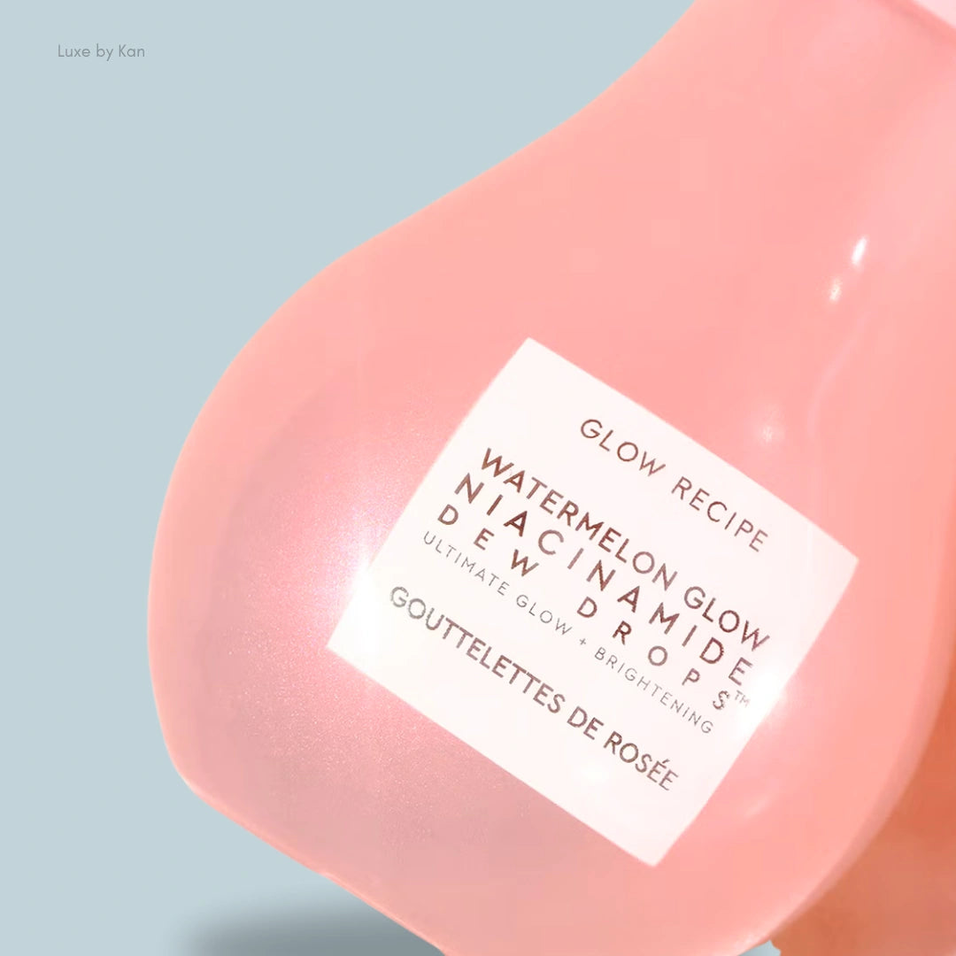 Pink bottle of Watermelon Glow Niacinamide Dew Drops from Glow Recipe, labeled for ultimate glow and brightening skincare.