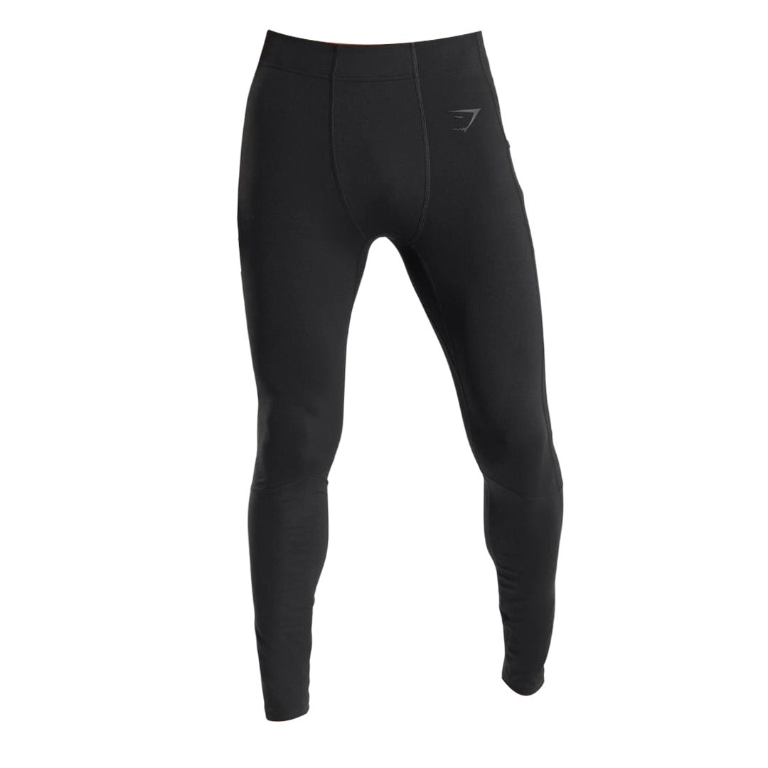 Black Control Baselayer Leggings with a fitted design, featuring a subtle logo.