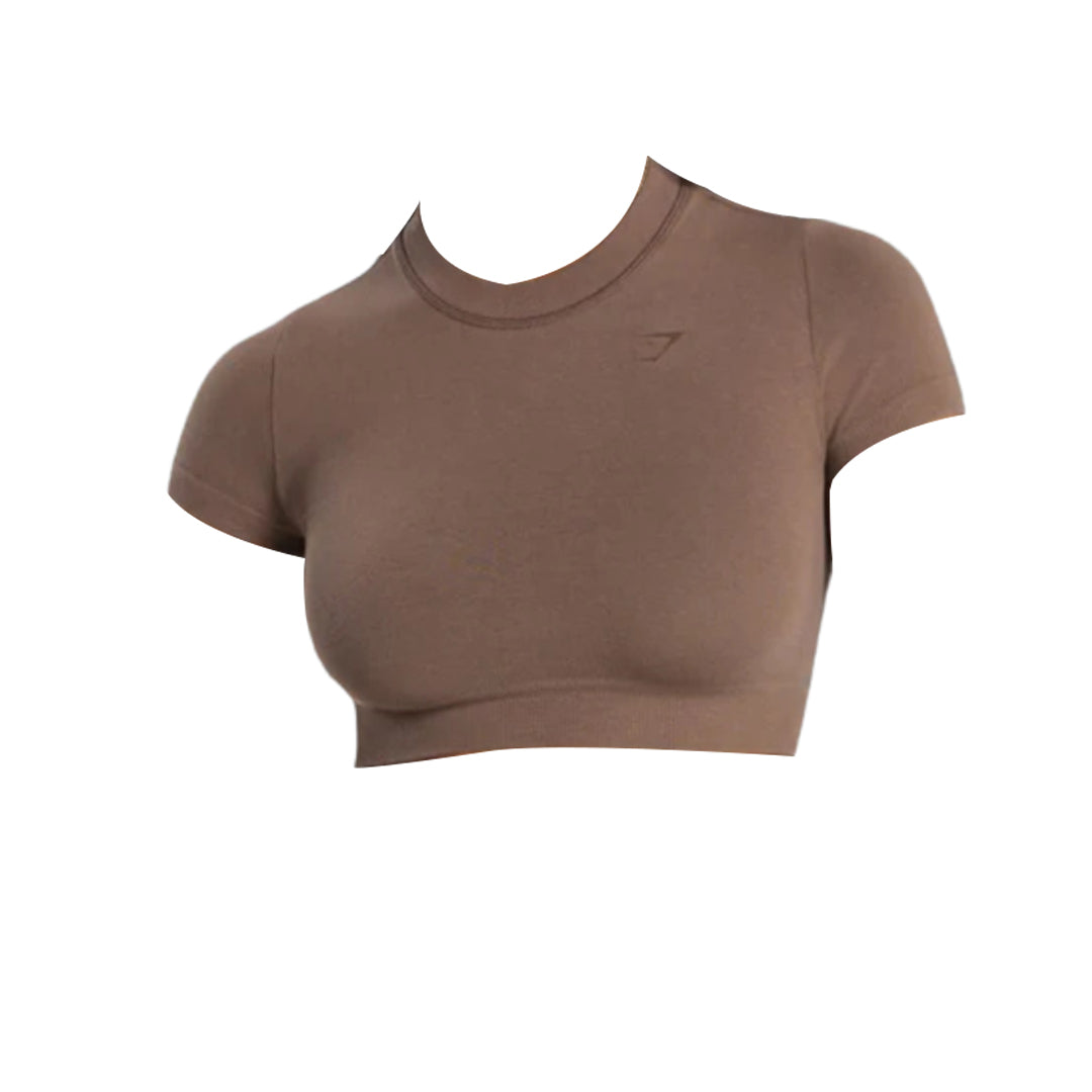 Cotton seamless crop top in brown with short sleeves, stretch fit, and ribbed neckline for a sleek, supportive athletic look.