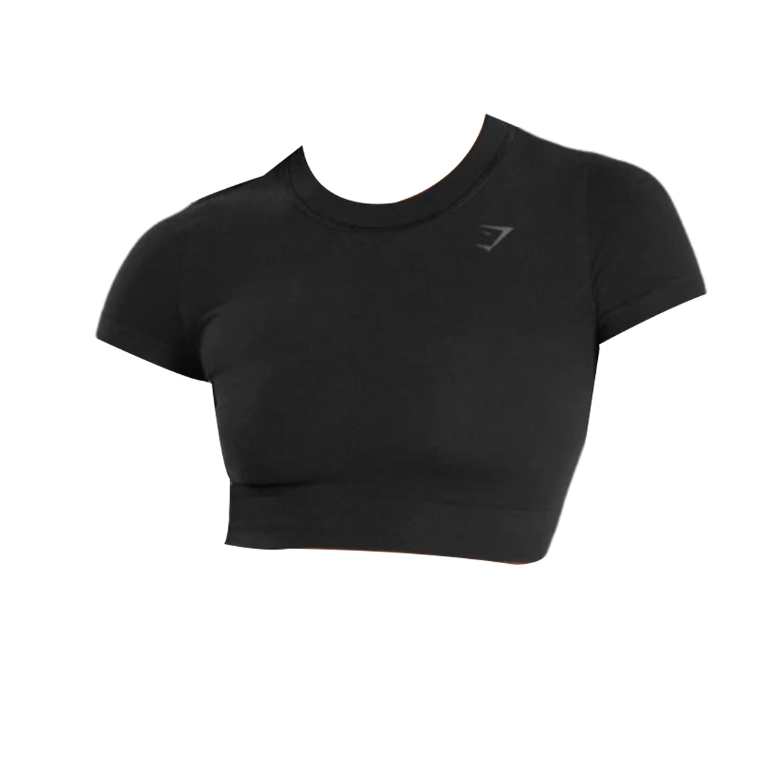 Gymshark cotton seamless crop top in black, featuring short sleeves, ribbed hem, and stretch fit for a sleek, supportive look.