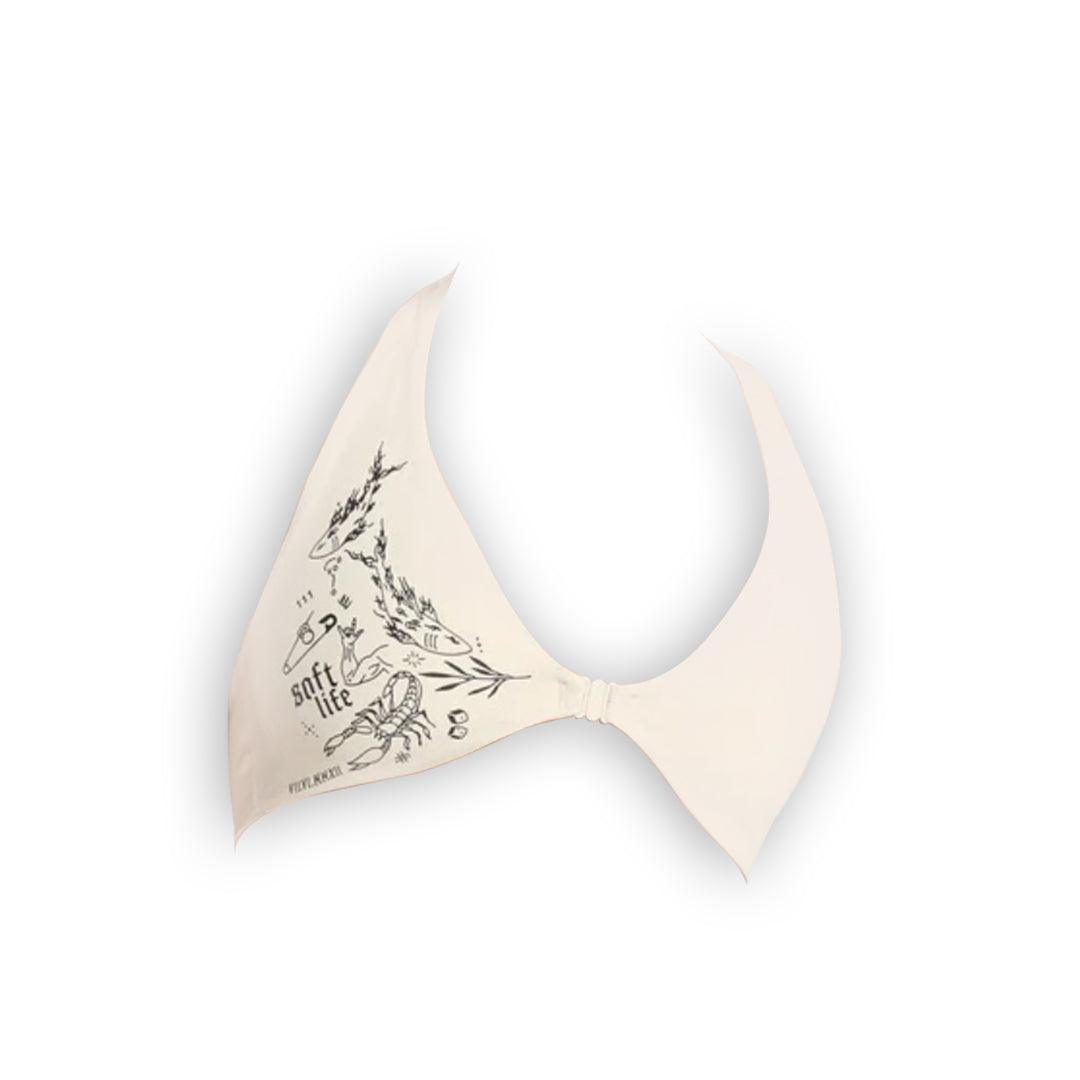 Cream triangle bikini top featuring marine-themed black illustrations including fish, seaweed, and the phrase "soft life."