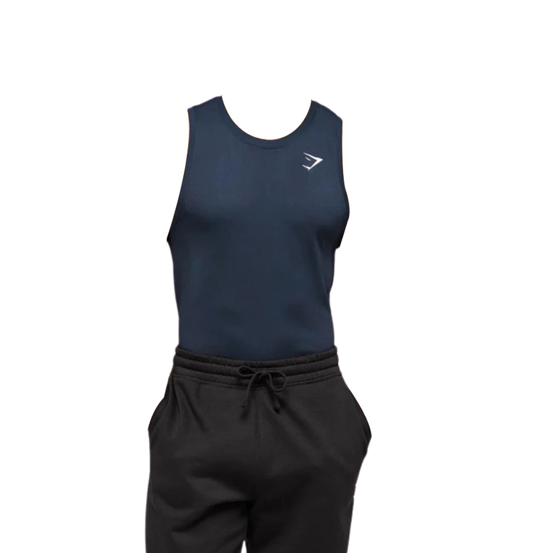 Navy blue sleeveless gym tank top with a light logo on the chest, paired with black drawstring sweatpants.