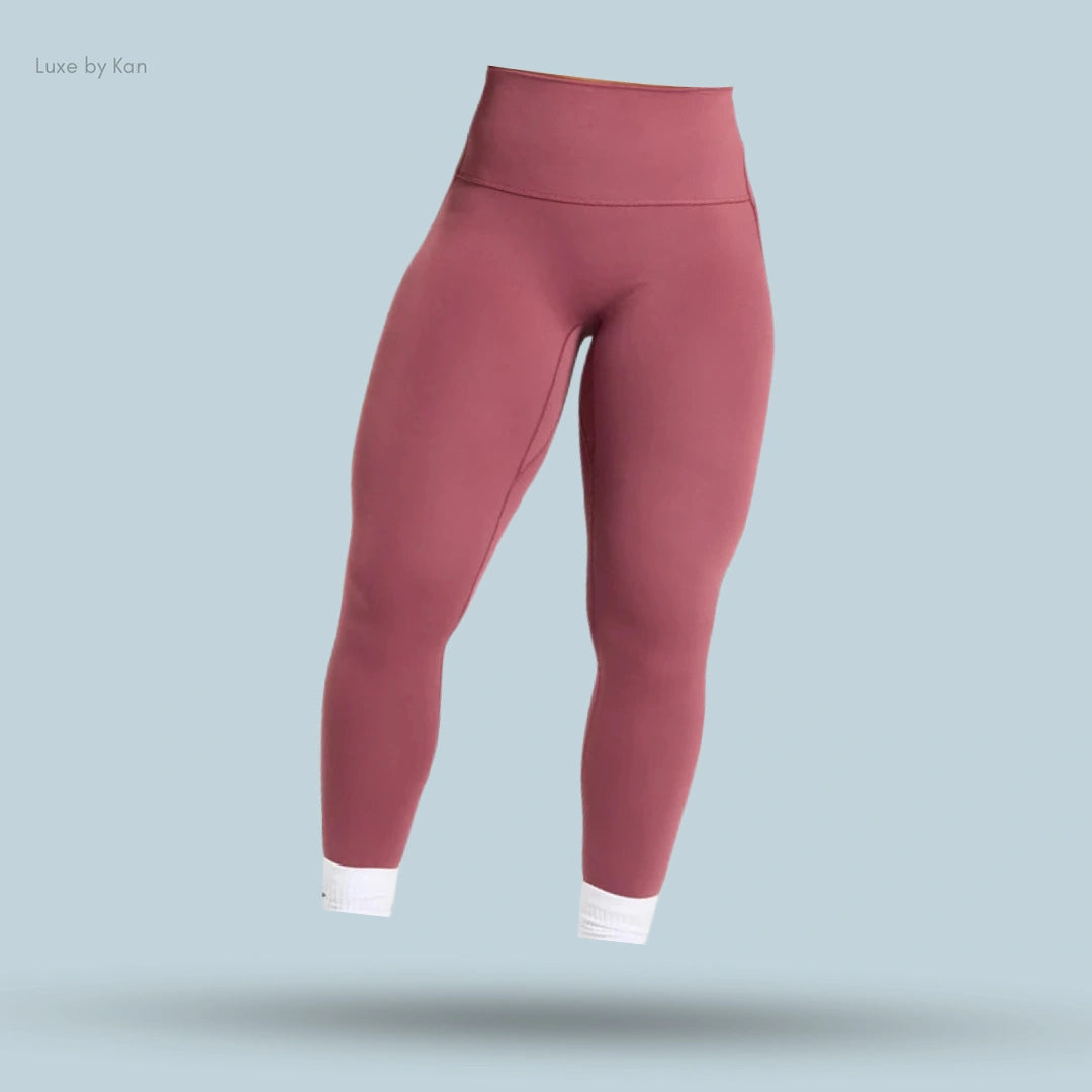 Gymshark Legacy Regular Leggings in a dusty rose color with white cuffs.