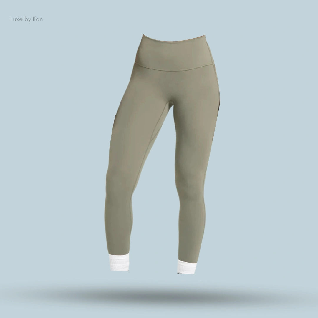 Gymshark Legacy regular-fit leggings in olive green with white cuffs.