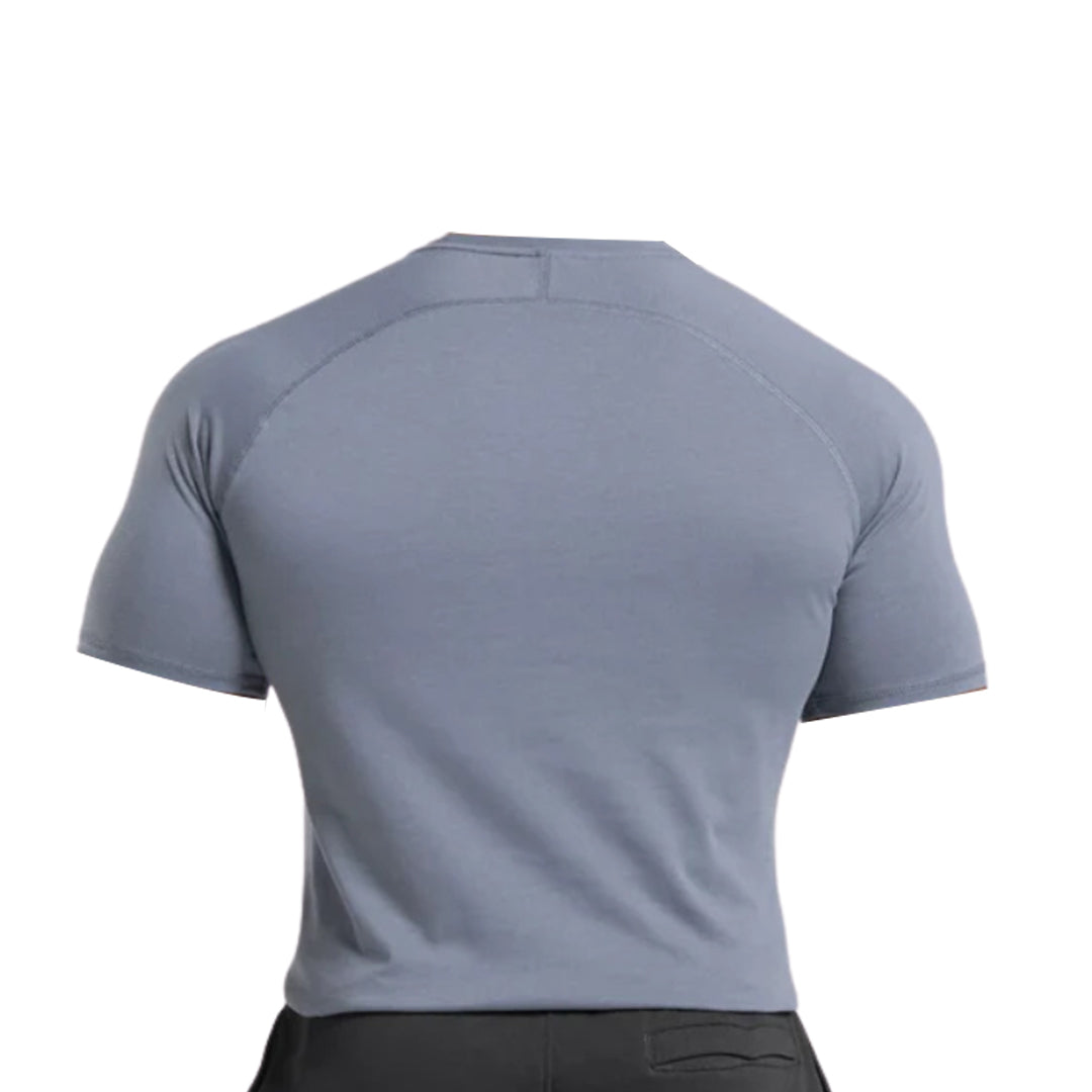 A man is shown from the back wearing a fitted short-sleeve gray impact t-shirt, highlighting the shirt's sleek design and athletic fit.
