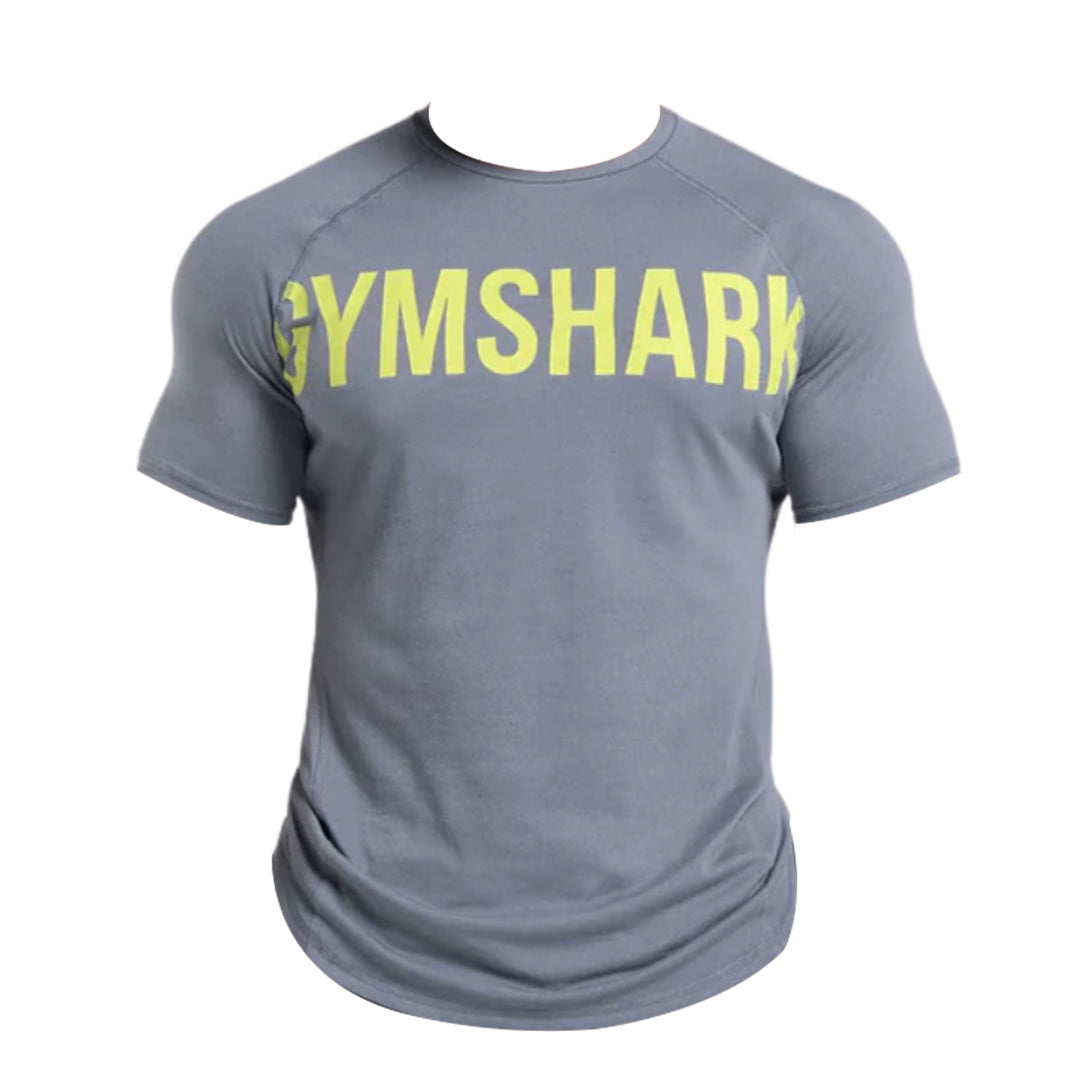 Gray Gymshark Athletic Impact T-Shirt with short sleeves and a bold yellow "GYMSHARK" logo across the front.
