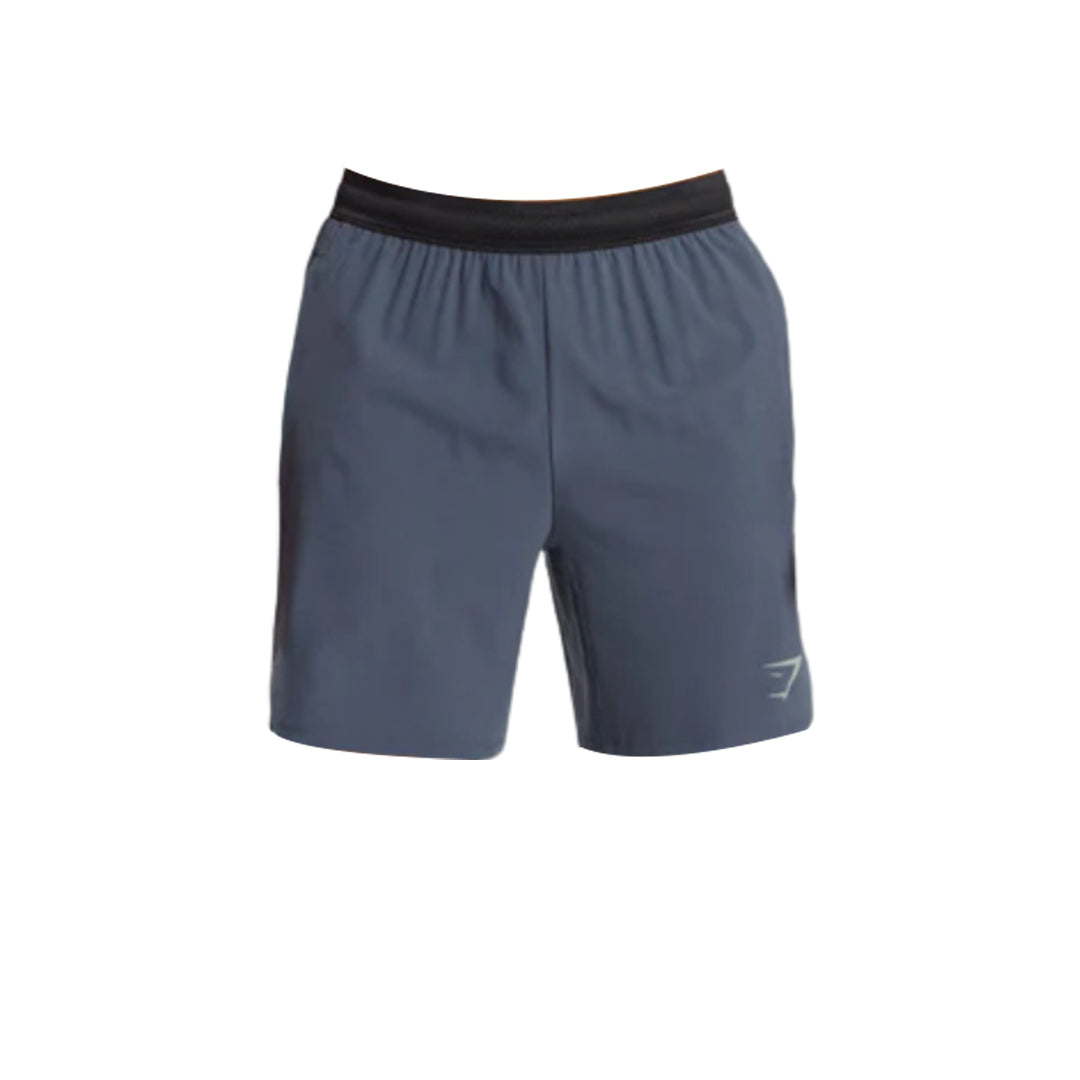 Dark grey Gymshark Speed 7" Shorts with a black elastic waistband and a small logo on the side.