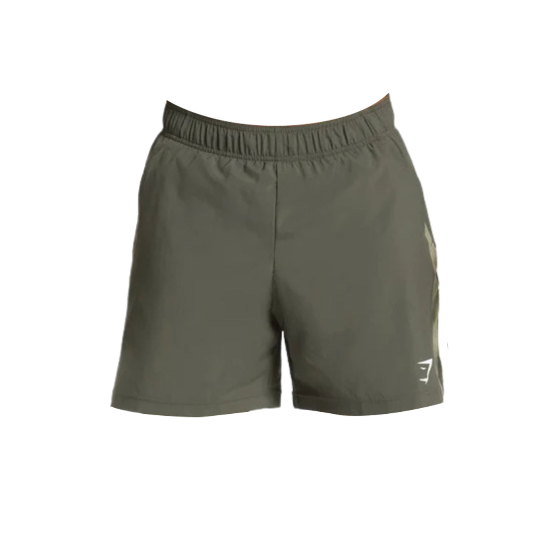 Gymshark men sport 7" 2 in 1 shorts in military green.