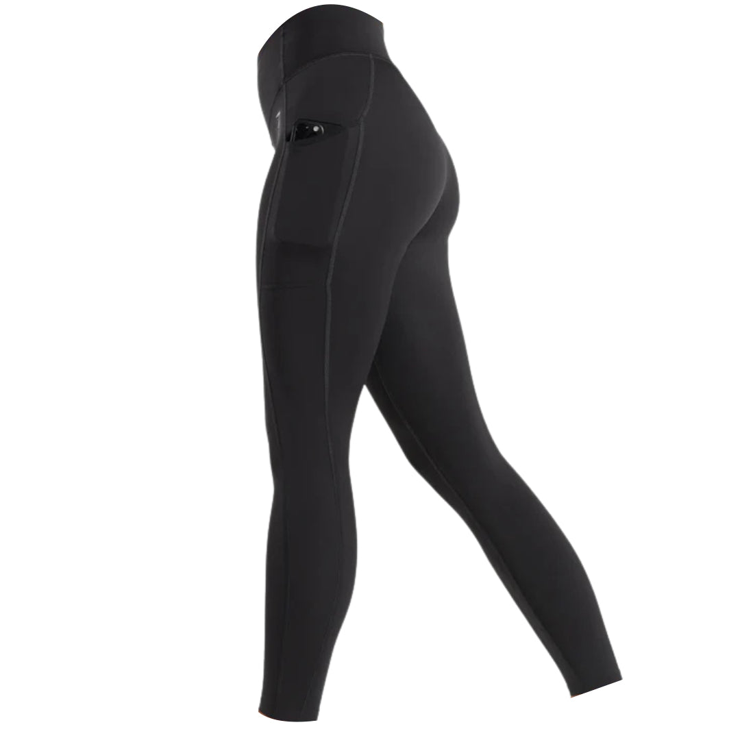 Black Gymshark leggings with a pocket on the right side of the hip containing a cell phone.