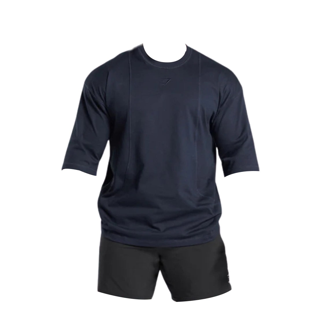 Men's navy blue athletic shirt with short sleeves, featuring a round neck and subtle logo design, displayed without a model.