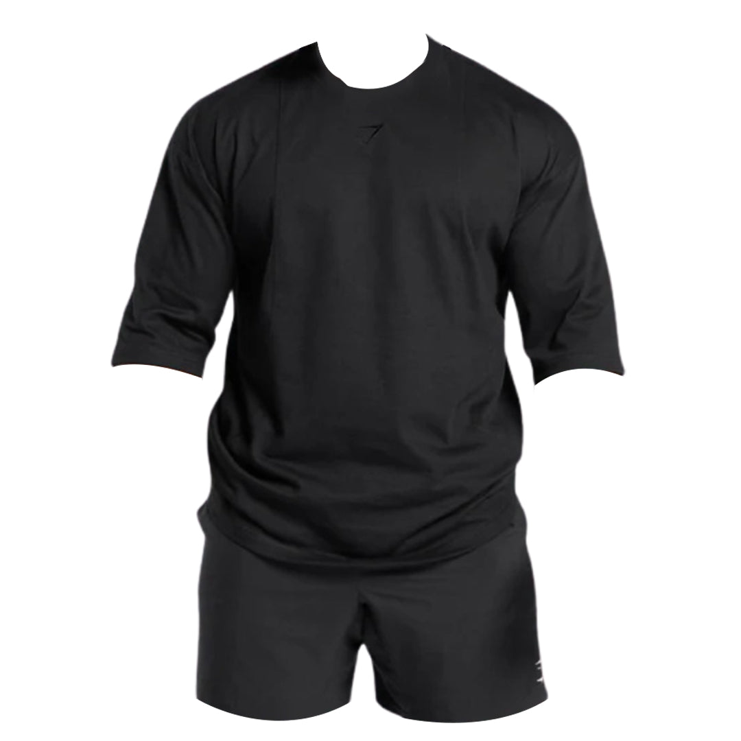 A plain black athletic outfit featuring a premium lifting t-shirt and shorts, designed for sports or casual wear.
