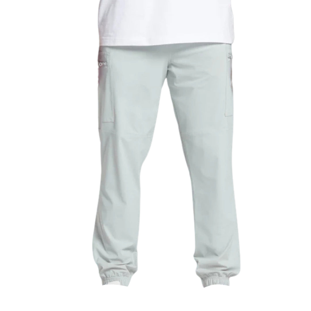 Light gray jogger pants with elastic cuffs and side pockets, paired with a plain white t-shirt.